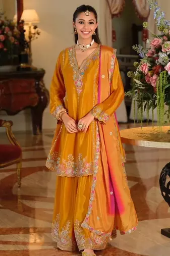 Yellow color smart and ethnic chinon fabric designer embroidered partywear palazzo suit