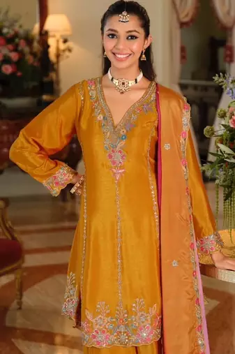 Yellow color smart and ethnic chinon fabric designer embroidered partywear palazzo suit