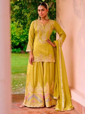 Yellow color smart and ethnic looks heavy ceremonial palazzo dress for treny girls 1
