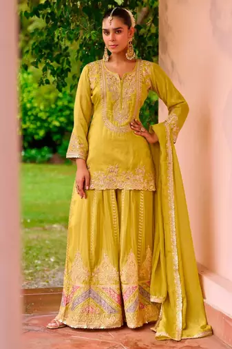Yellow color smart and ethnic looks heavy ceremonial palazzo dress for treny girls