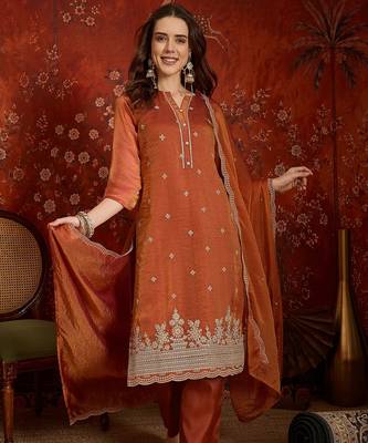 Rust color smart and ethnic silk fabric embroidered partywear suit 1