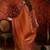 Rust color smart and ethnic silk fabric embroidered partywear suit
