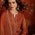 Rust color smart and ethnic silk fabric embroidered partywear suit