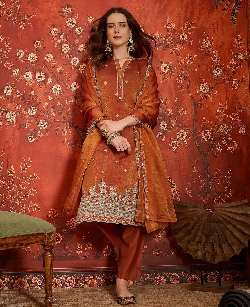 Rust color smart and ethnic silk fabric embroidered partywear suit