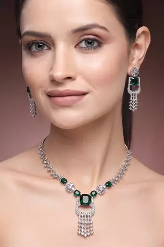 green necklace set with matching earrings for women