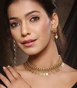 Gold plated temple necklace set with multicolor stones and matching earrings