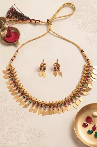 Gold plated temple necklace set with multicolor stones and matching earrings