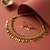 Gold plated temple necklace set with multicolor stones and matching earrings