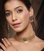 Gold plated temple necklace set with multicolor stones and matching earrings