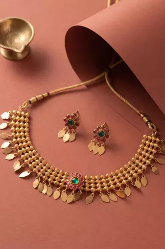Gold plated temple necklace set with multicolor stones and matching earrings