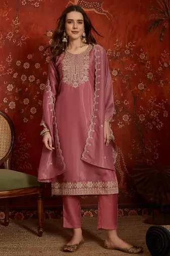 Pink color smart and ethnic silk fabric embroidered partywear suit