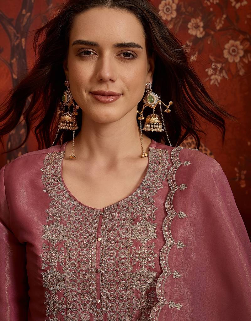 Pink color smart and ethnic silk fabric embroidered partywear suit