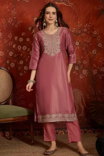 Pink color smart and ethnic silk fabric embroidered partywear suit
