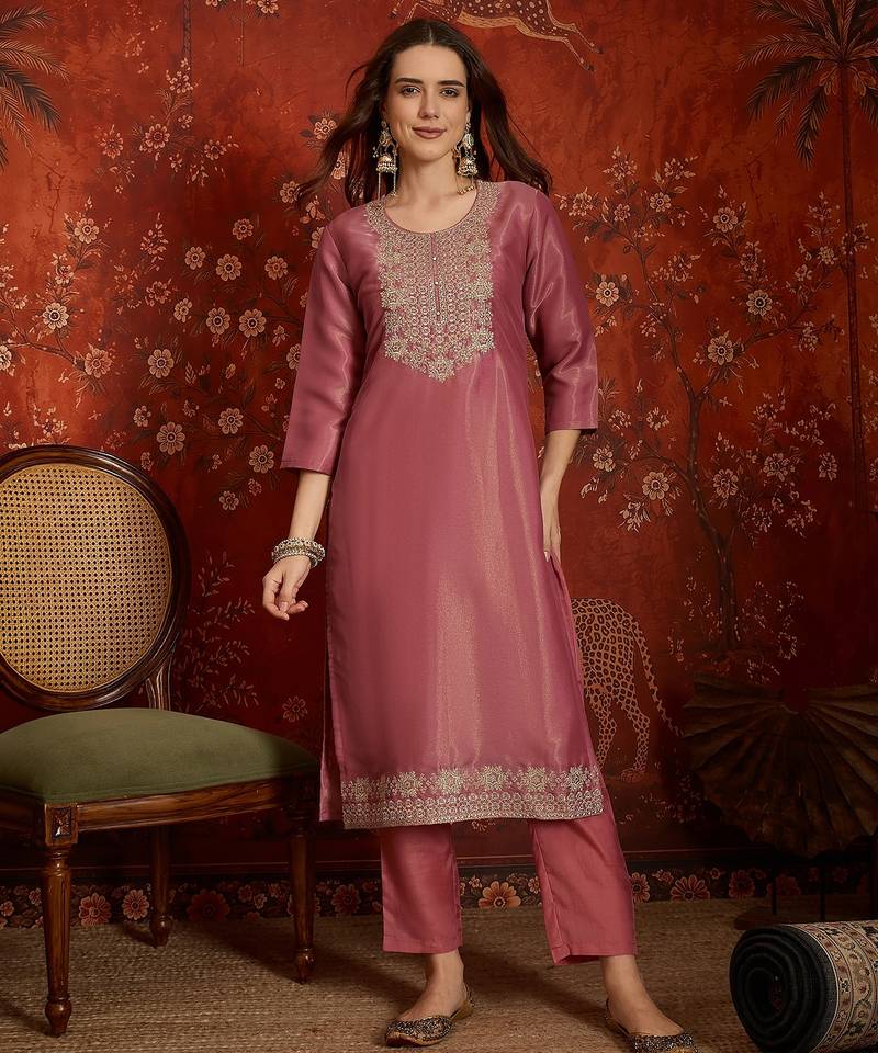 Pink color smart and ethnic silk fabric embroidered partywear suit