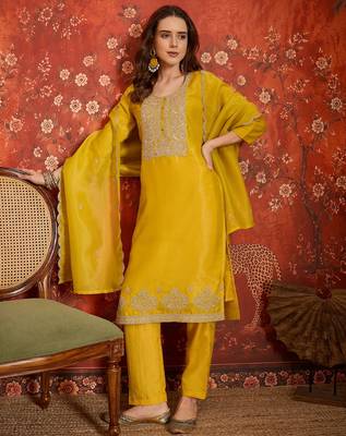 Yellow color smart and ethnic silk fabric embroidered partywear suit 1