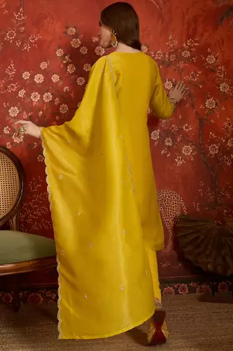 Yellow color smart and ethnic silk fabric embroidered partywear suit