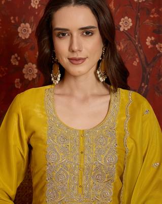 Yellow color smart and ethnic silk fabric embroidered partywear suit 3