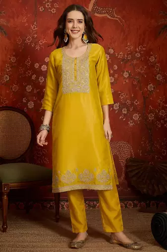 Yellow color smart and ethnic silk fabric embroidered partywear suit
