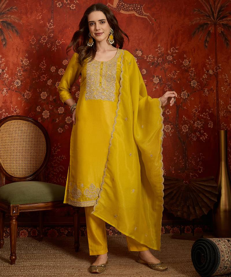 Yellow color smart and ethnic silk fabric embroidered partywear suit