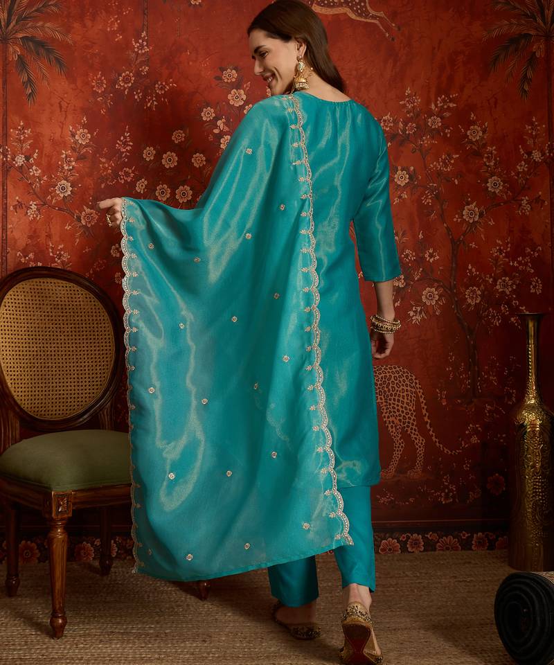 Firozi color smart and ethnic silk fabric embroidered partywear suit