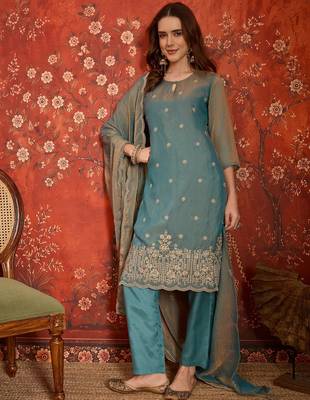 Blue color smart and ethnic silk fabric embroidered partywear suit 1