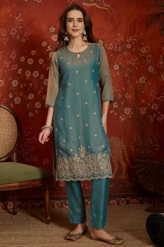 Blue color smart and ethnic silk fabric embroidered partywear suit
