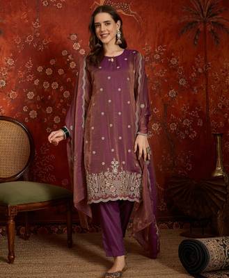 Purple color smart and ethnic silk fabric embroidered partywear suit 1