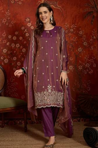 Purple color smart and ethnic silk fabric embroidered partywear suit