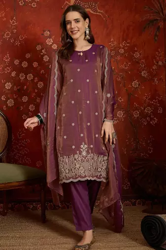 Purple color smart and ethnic silk fabric embroidered partywear suit