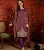 Purple color smart and ethnic silk fabric embroidered partywear suit