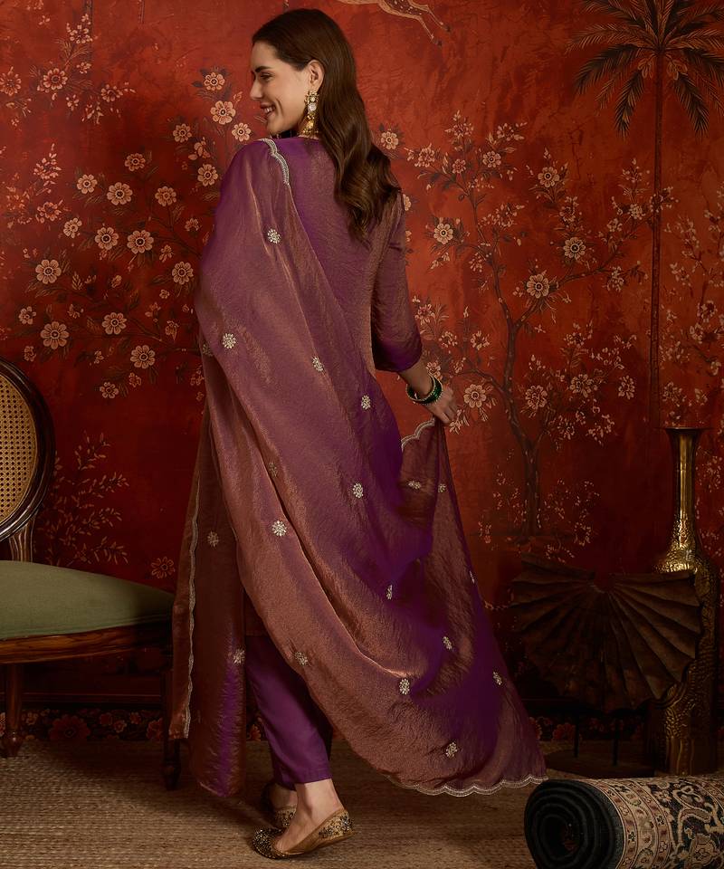 Purple color smart and ethnic silk fabric embroidered partywear suit