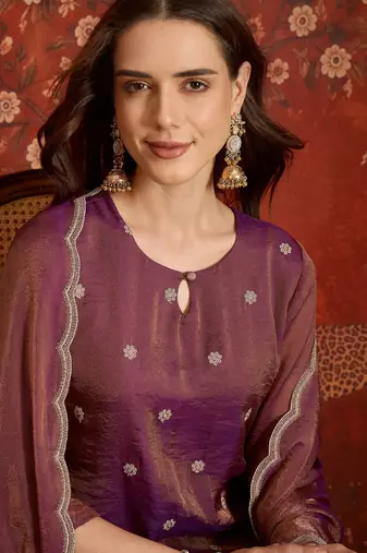 Purple color smart and ethnic silk fabric embroidered partywear suit