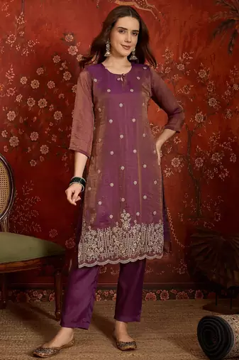 Purple color smart and ethnic silk fabric embroidered partywear suit