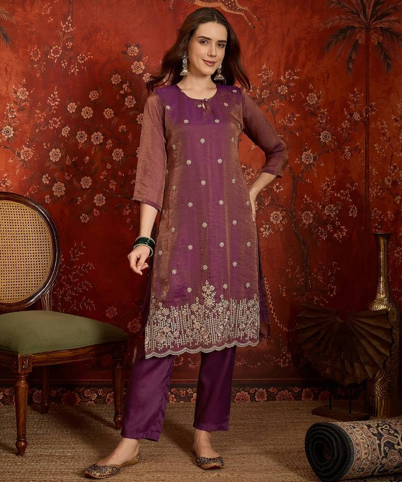 Purple color smart and ethnic silk fabric embroidered partywear suit