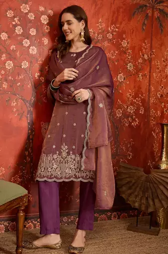 Purple color smart and ethnic silk fabric embroidered partywear suit