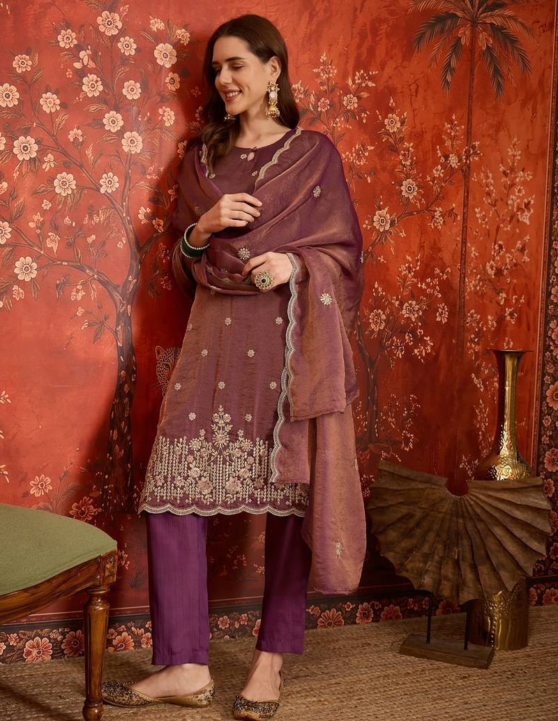 Purple color smart and ethnic silk fabric embroidered partywear suit