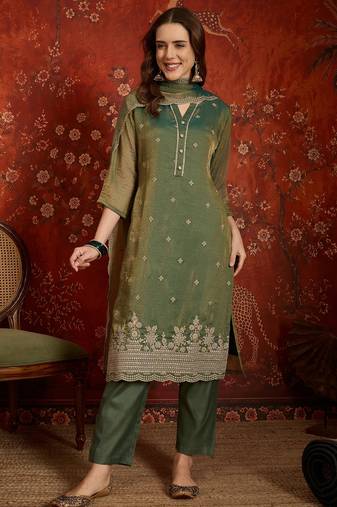 Green color smart and ethnic silk fabric embroidered partywear suit