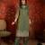 Green color smart and ethnic silk fabric embroidered partywear suit