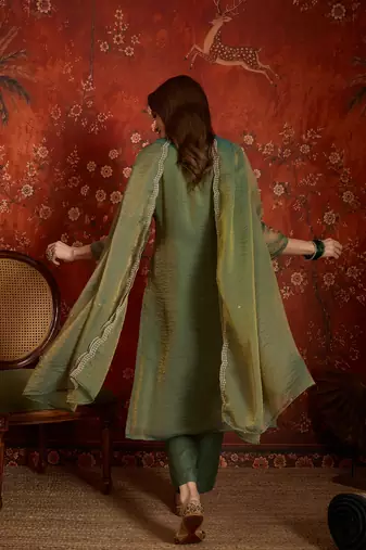 Green color smart and ethnic silk fabric embroidered partywear suit