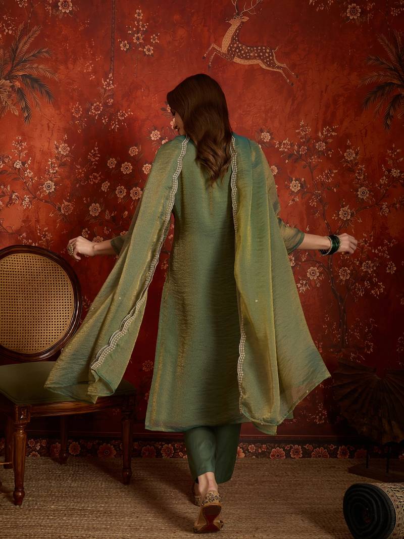 Green color smart and ethnic silk fabric embroidered partywear suit