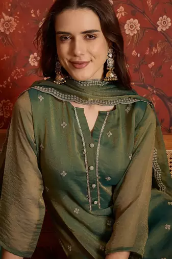 Green color smart and ethnic silk fabric embroidered partywear suit