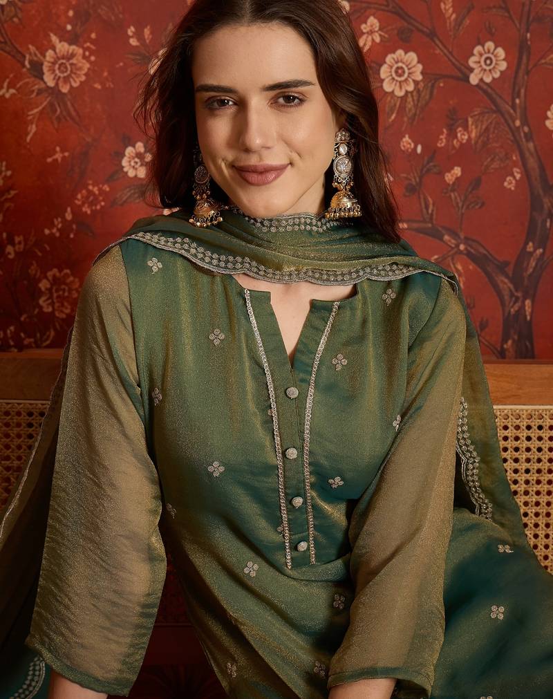 Green color smart and ethnic silk fabric embroidered partywear suit