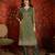 Green color smart and ethnic silk fabric embroidered partywear suit