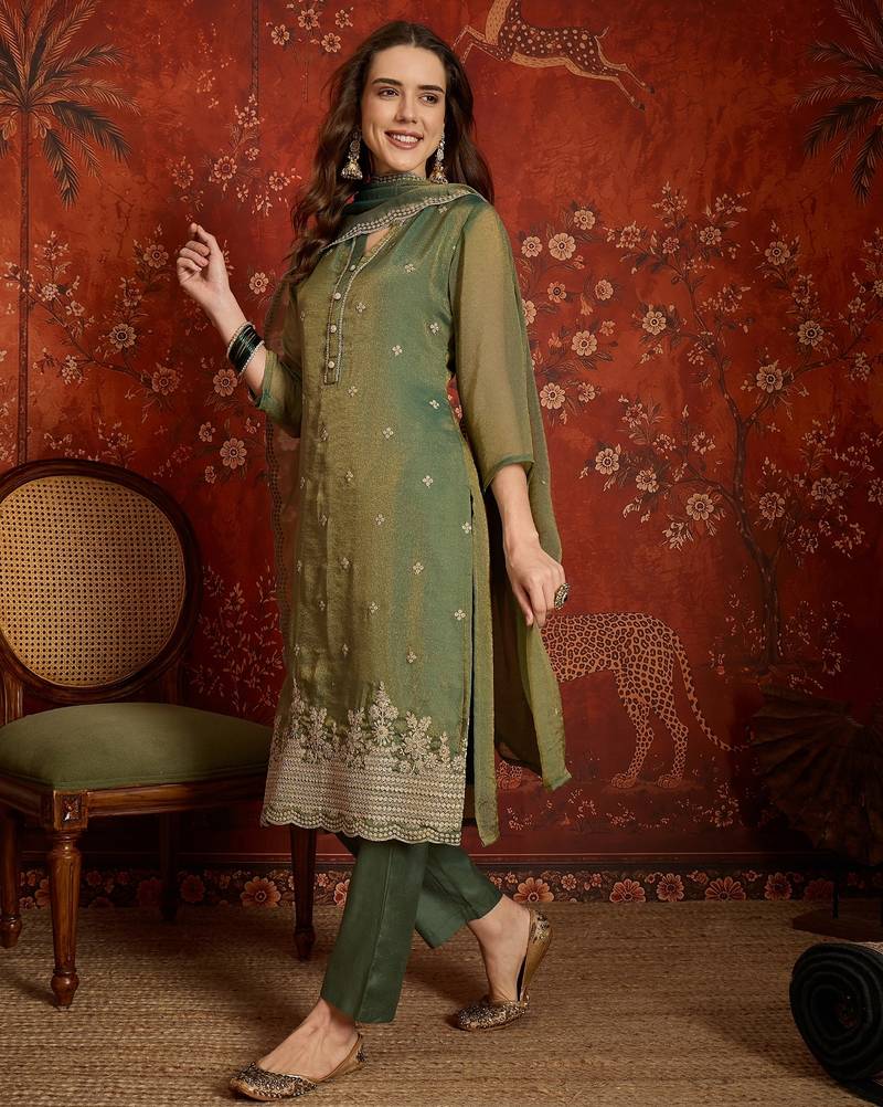 Green color smart and ethnic silk fabric embroidered partywear suit