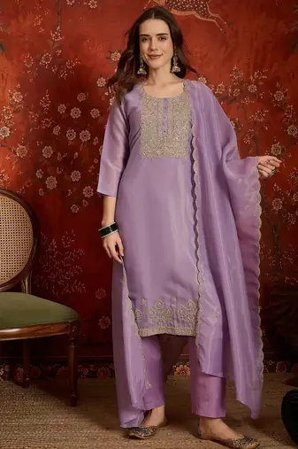 Purple color smart and ethnic silk fabric embroidered partywear suit
