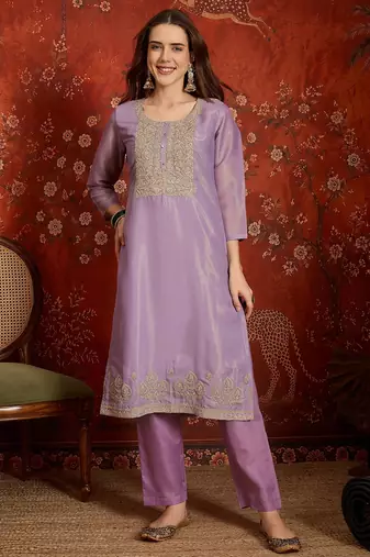 Purple color smart and ethnic silk fabric embroidered partywear suit