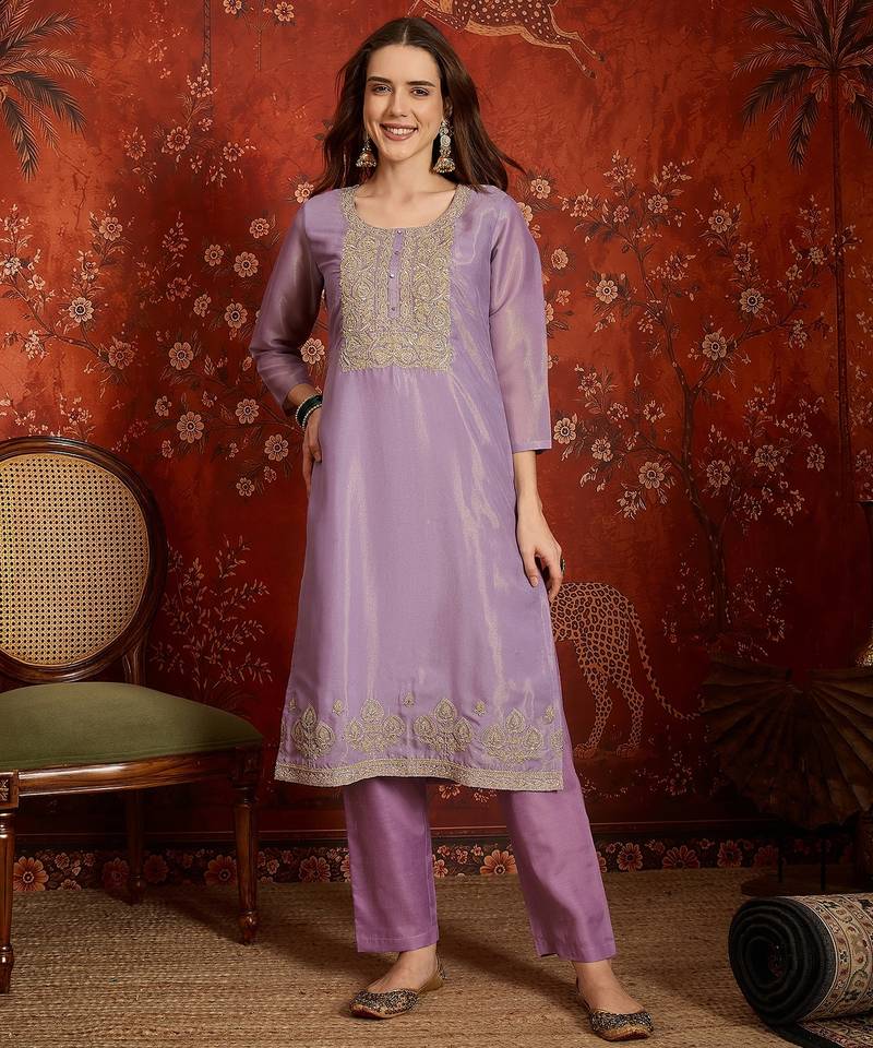 Purple color smart and ethnic silk fabric embroidered partywear suit