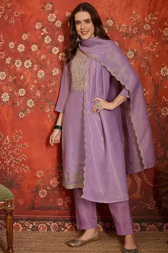 Purple color smart and ethnic silk fabric embroidered partywear suit