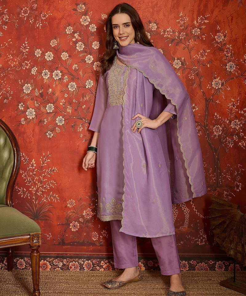 Purple color smart and ethnic silk fabric embroidered partywear suit