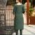 Green color smart and elegant roman silk fabric smart looks top bottom set